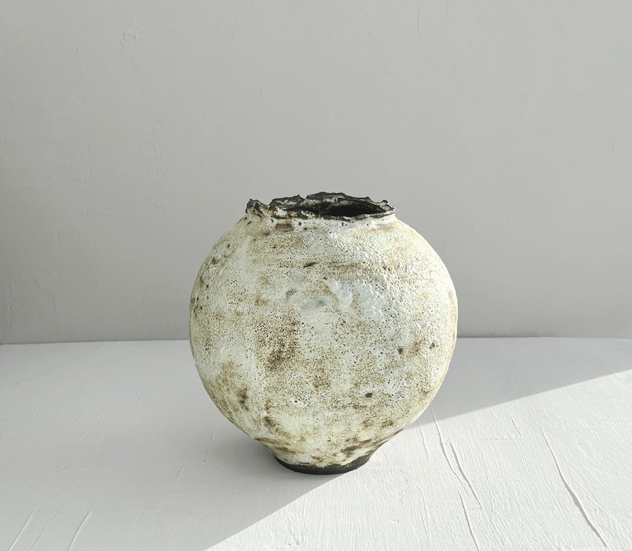 Textured ceramic moon vase